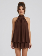 Women's mini dress with halter neck, open back and tiered ruffle hem