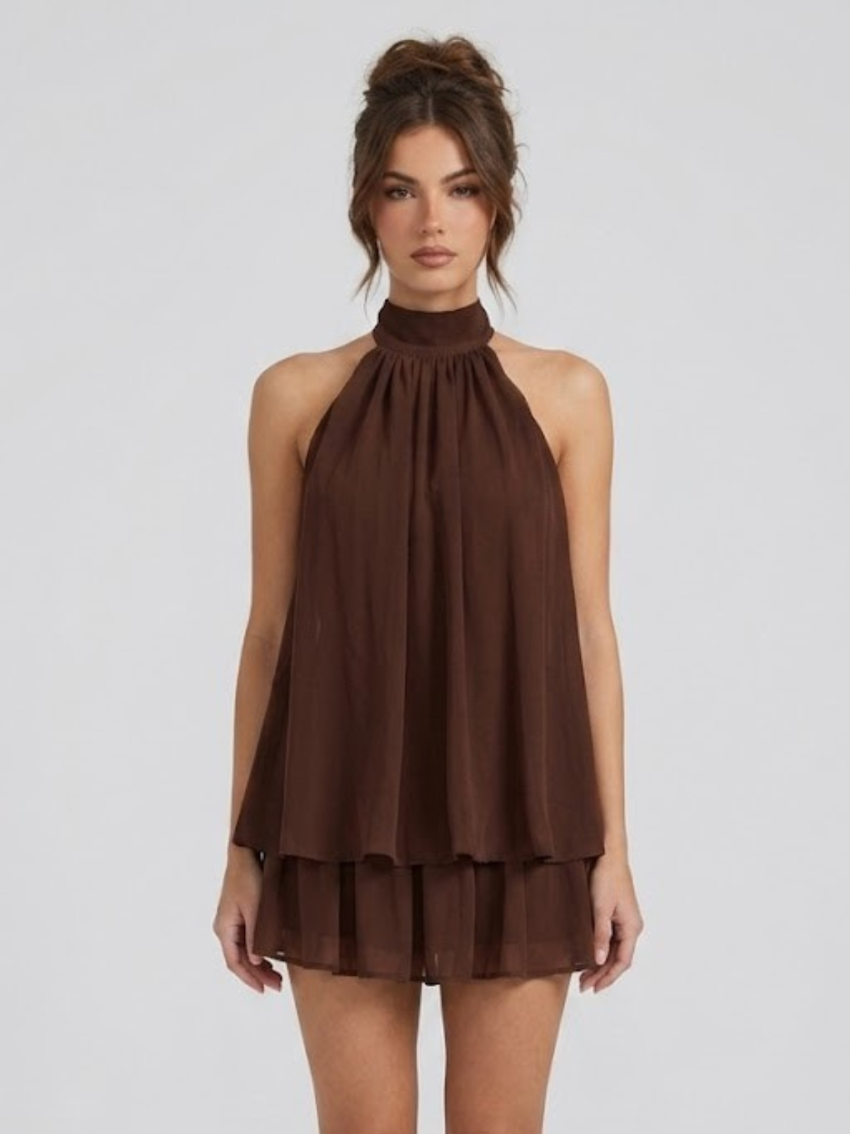 Women's mini dress with halter neck, open back and tiered ruffle hem