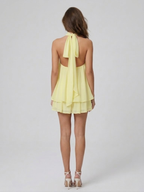 Women's mini dress with halter neck, open back and tiered ruffle hem