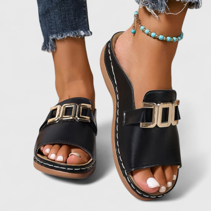 Women's open toe flat sandals with gold hardware detail
