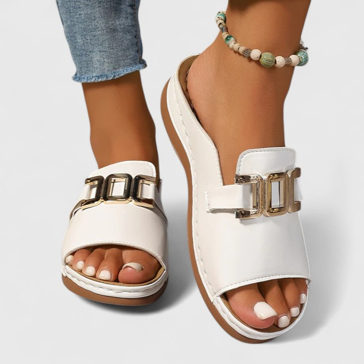 Women's open toe flat sandals with gold hardware detail