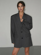 Women's oversized blazer with button fastening
