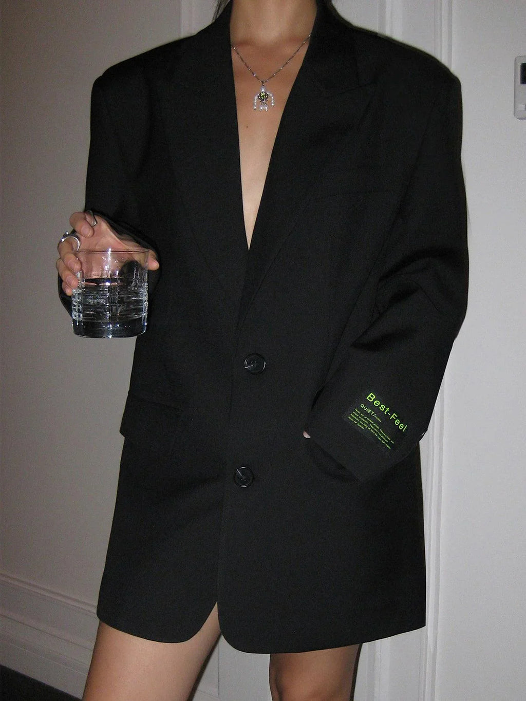 Women's oversized blazer with button fastening