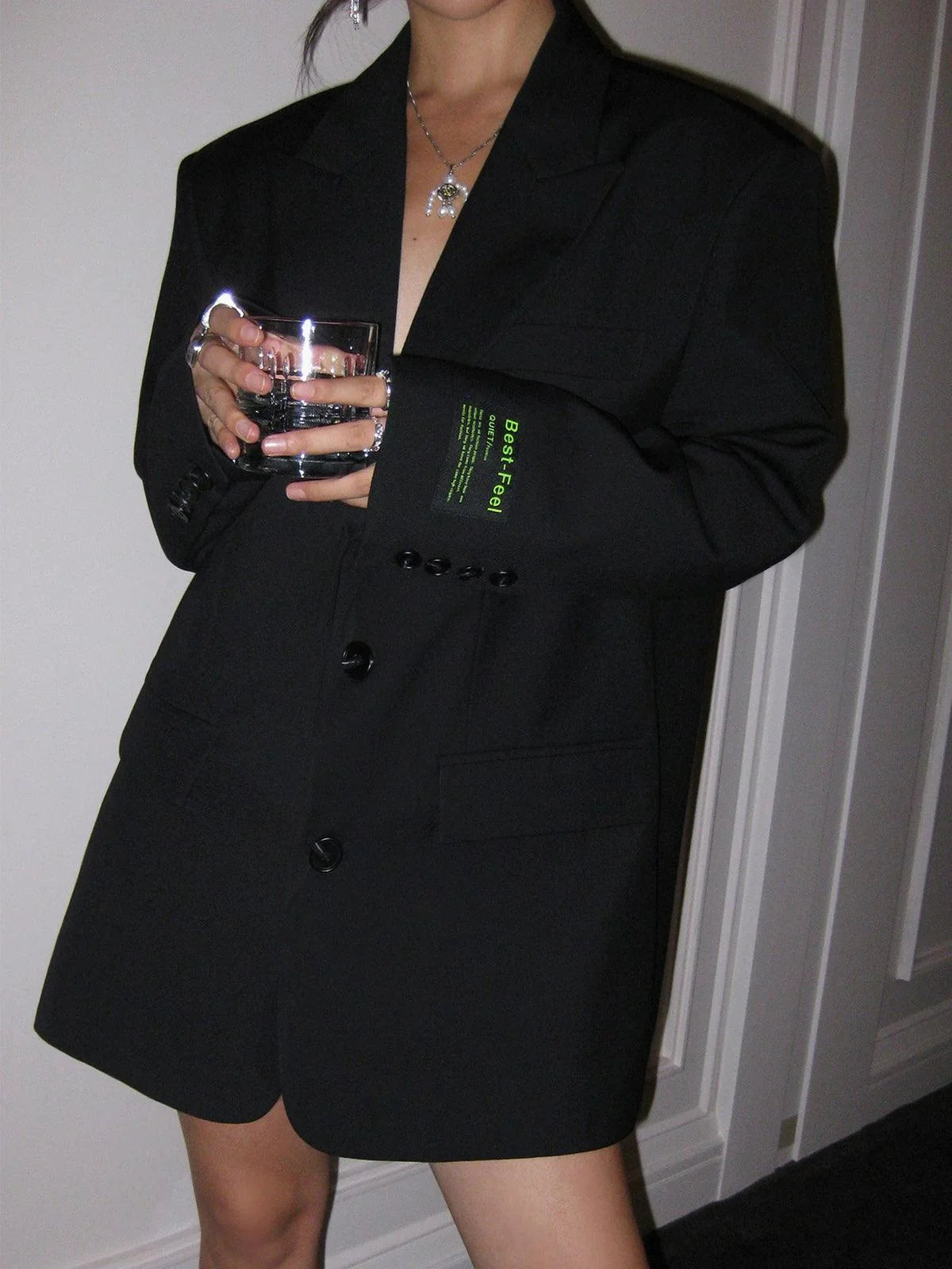 Women's oversized blazer with button fastening