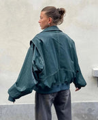 Women's oversized jacket with dropped shoulders and zip fastening