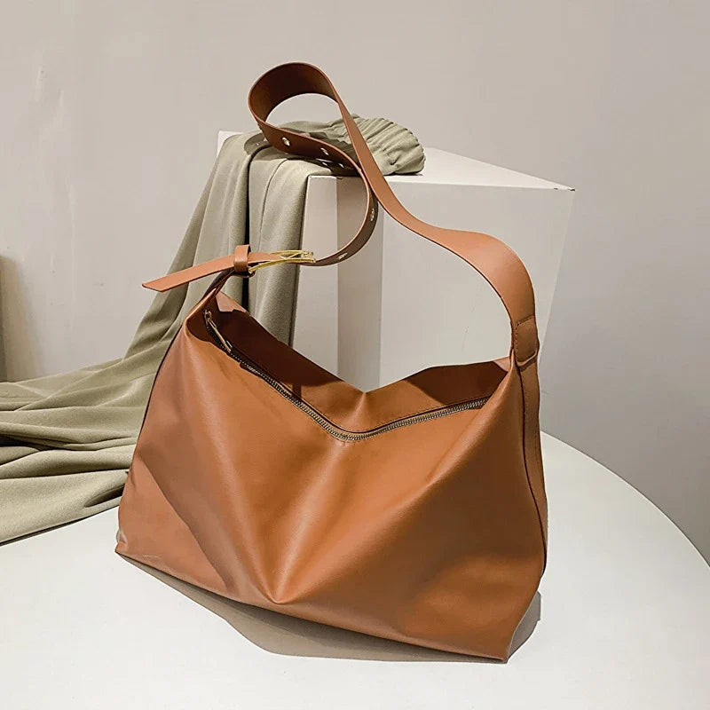 Women's oversized structured shoulder tote bag with buckle strap detail