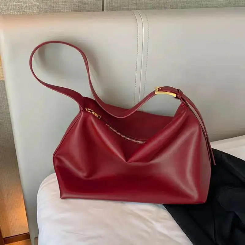 Women's oversized structured shoulder tote bag with buckle strap detail