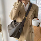 Women's oversized structured shoulder tote bag with buckle strap detail