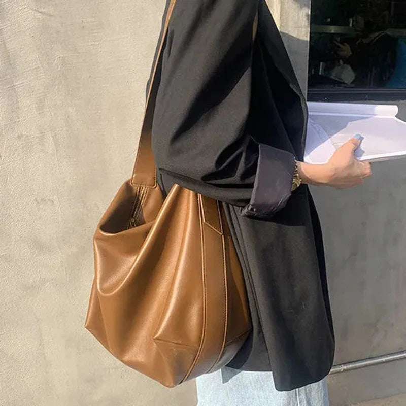 Women's oversized structured shoulder tote bag with buckle strap detail