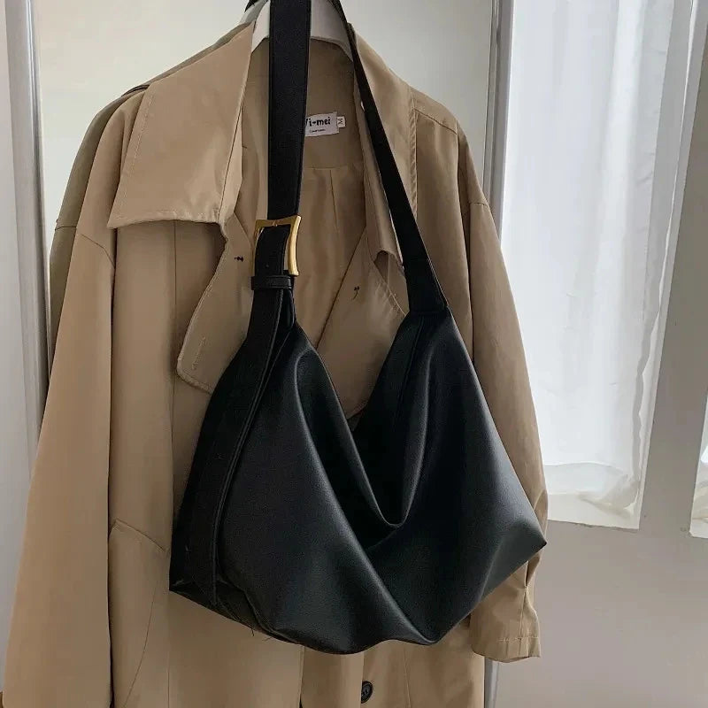 Women's oversized structured shoulder tote bag with buckle strap detail