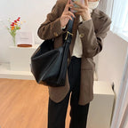 Women's oversized structured shoulder tote bag with buckle strap detail