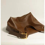 Women's oversized structured shoulder tote bag with buckle strap detail