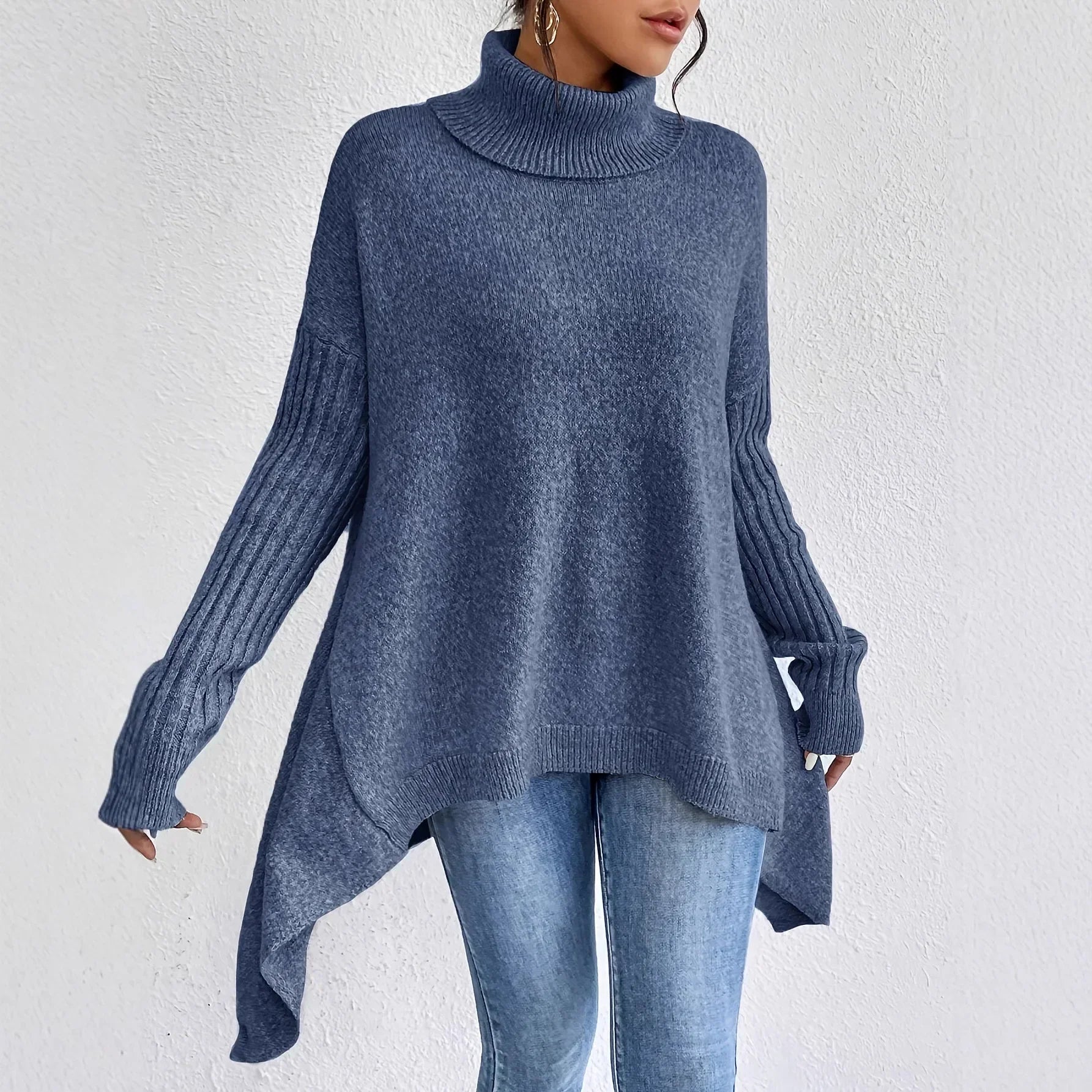 Women's oversized turtleneck sweater with asymmetric hem and batwing sleeves