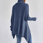 Women's oversized turtleneck sweater with asymmetric hem and batwing sleeves