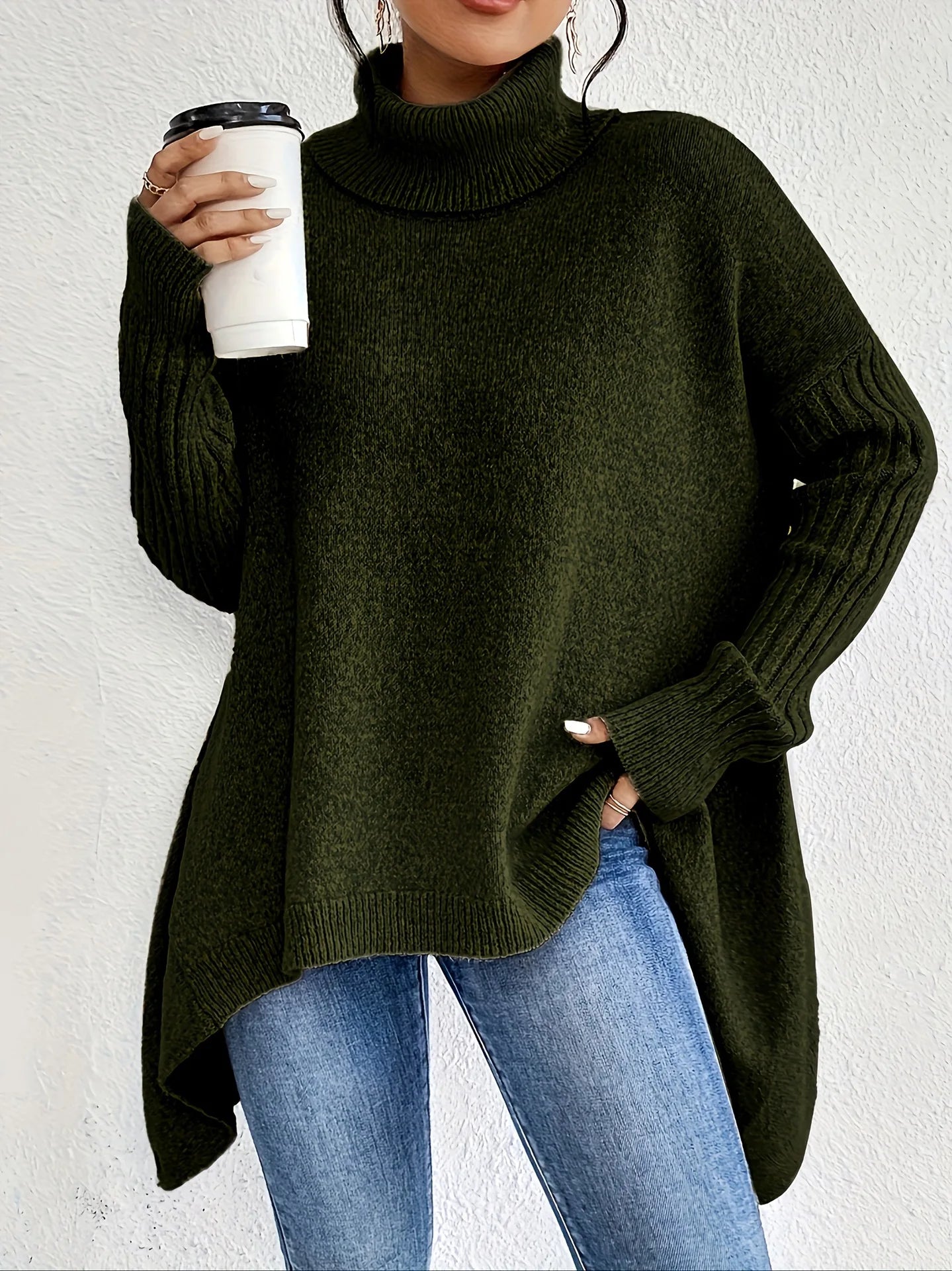 Women's oversized turtleneck sweater with asymmetric hem and batwing sleeves