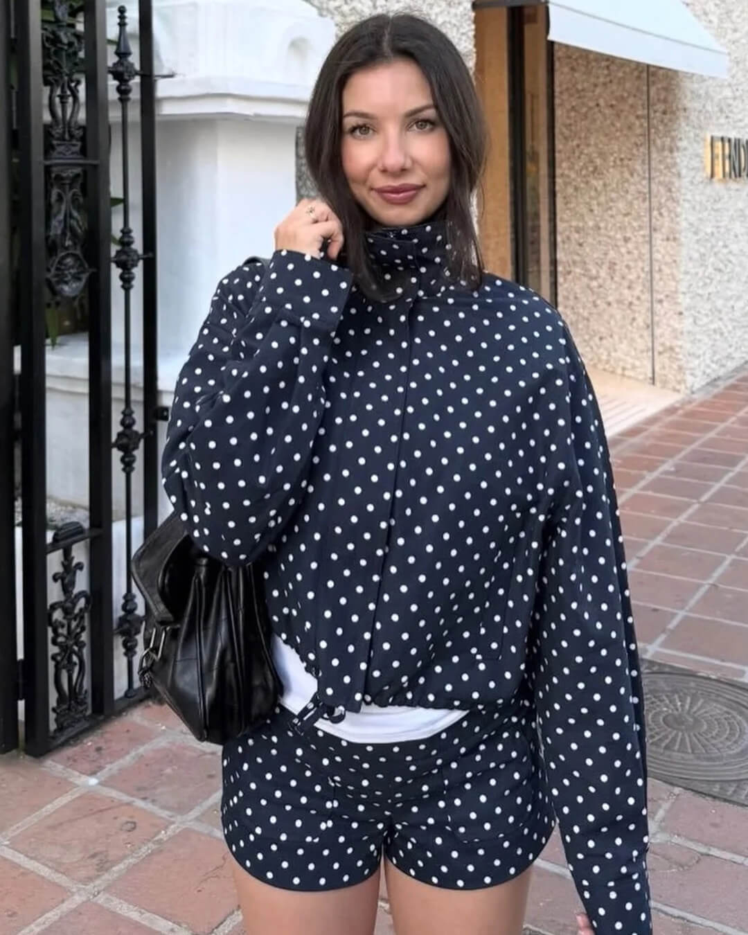 Women's polka dot turtleneck jacket with ruffle sleeves