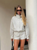 Women's polka dot turtleneck jacket with ruffle sleeves