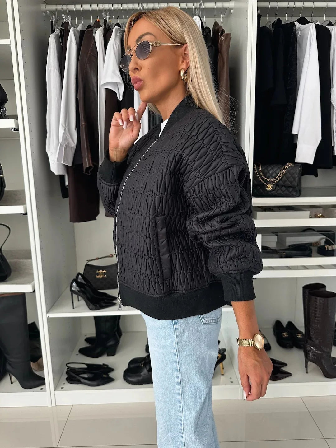 Women's quilted zip-front bomber jacket with long sleeves