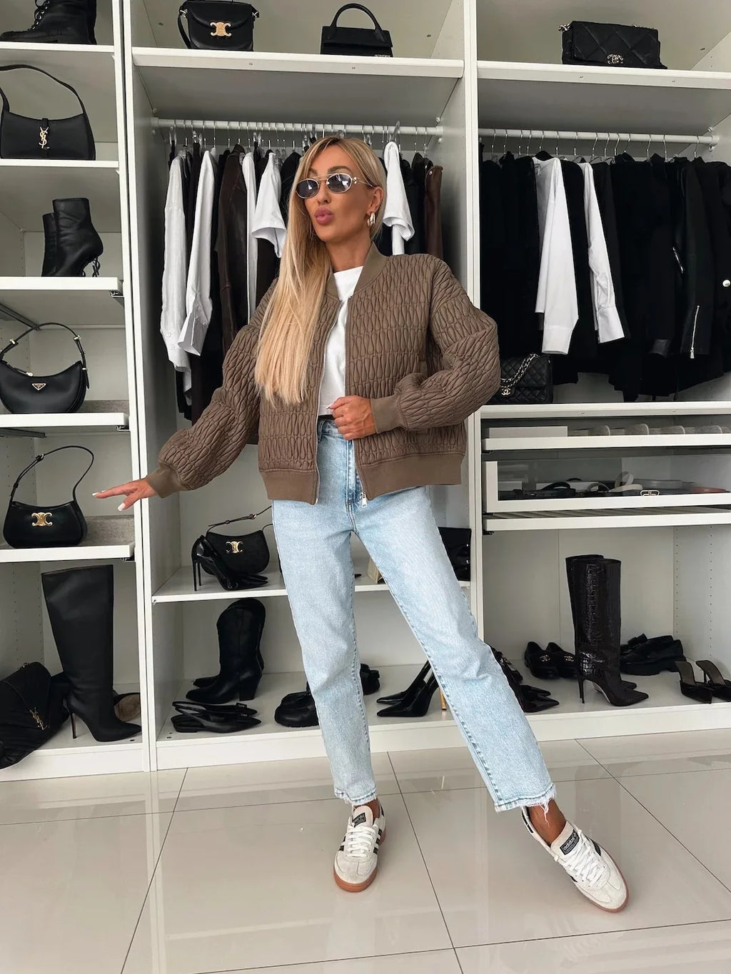 Women's quilted zip-front bomber jacket with long sleeves