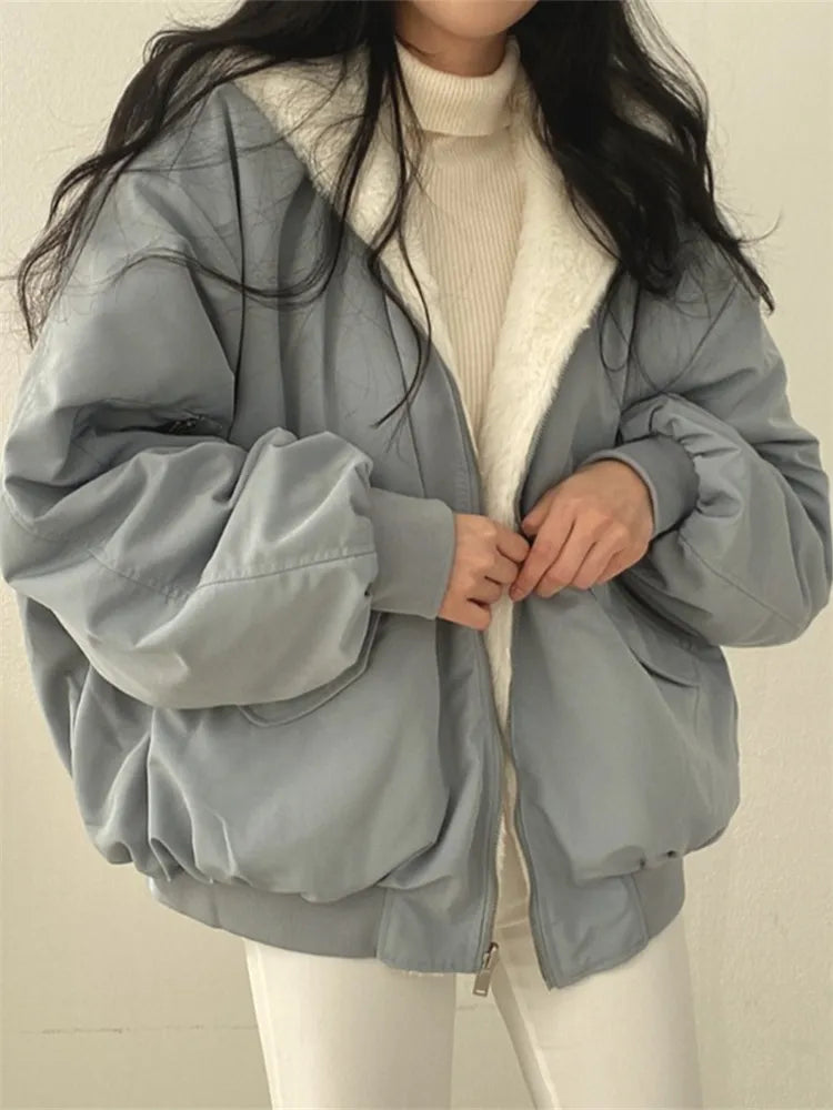 Women's reversible winter jacket with faux-fur interior