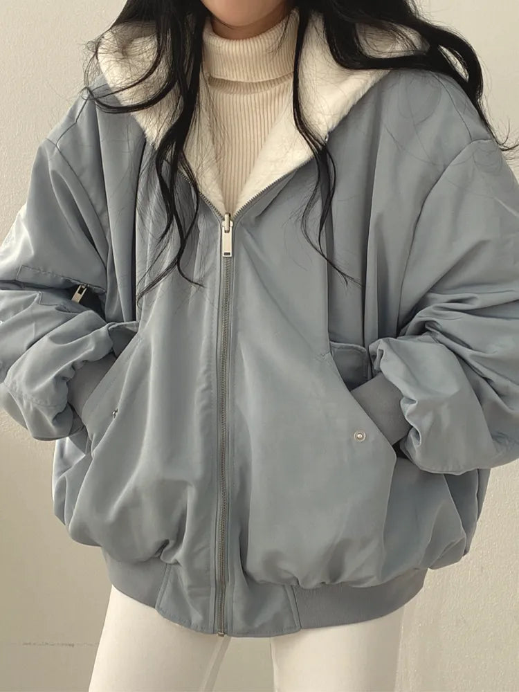 Women's reversible winter jacket with faux-fur interior