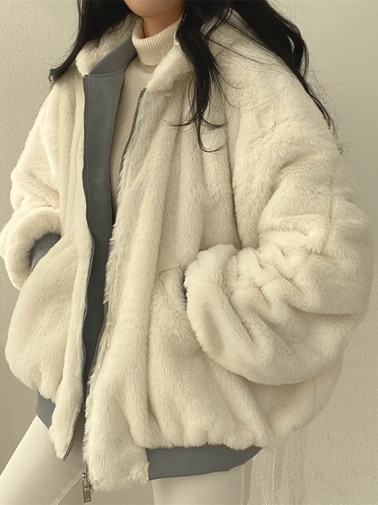 Women's reversible winter jacket with faux-fur interior