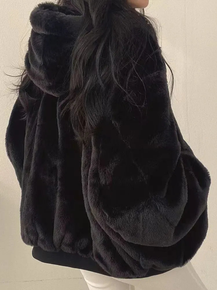 Women's reversible winter jacket with faux-fur interior