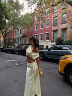 Women's satin one-shoulder pleated crop top and maxi skirt two-piece set