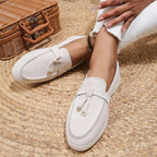 Women's slip-on flatform loafers with metal eyelet detail