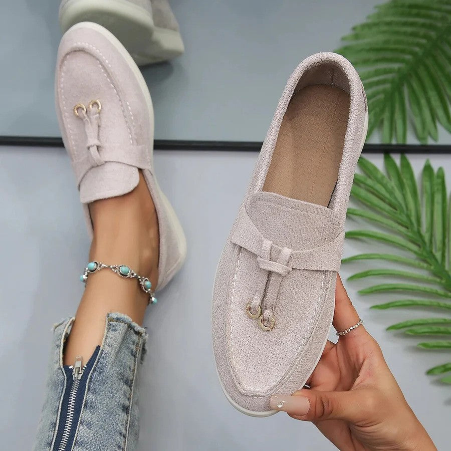 Women's slip-on flatform loafers with metal eyelet detail