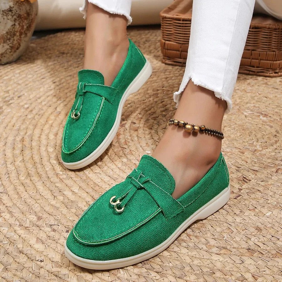 Women's slip-on flatform loafers with metal eyelet detail