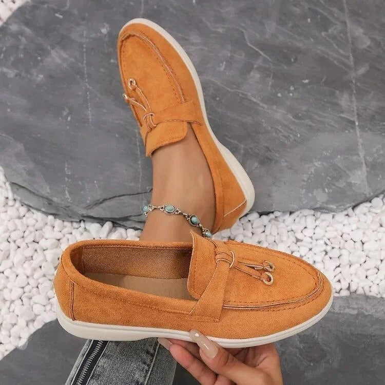 Women's slip-on flatform loafers with metal eyelet detail