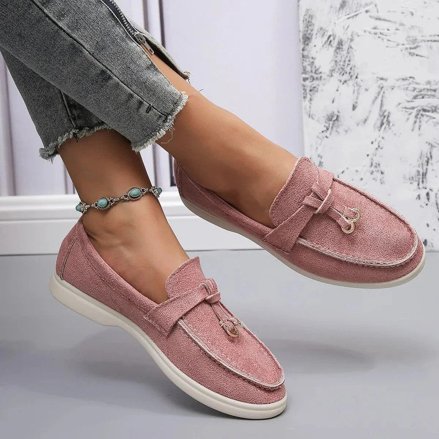 Women's slip-on flatform loafers with metal eyelet detail