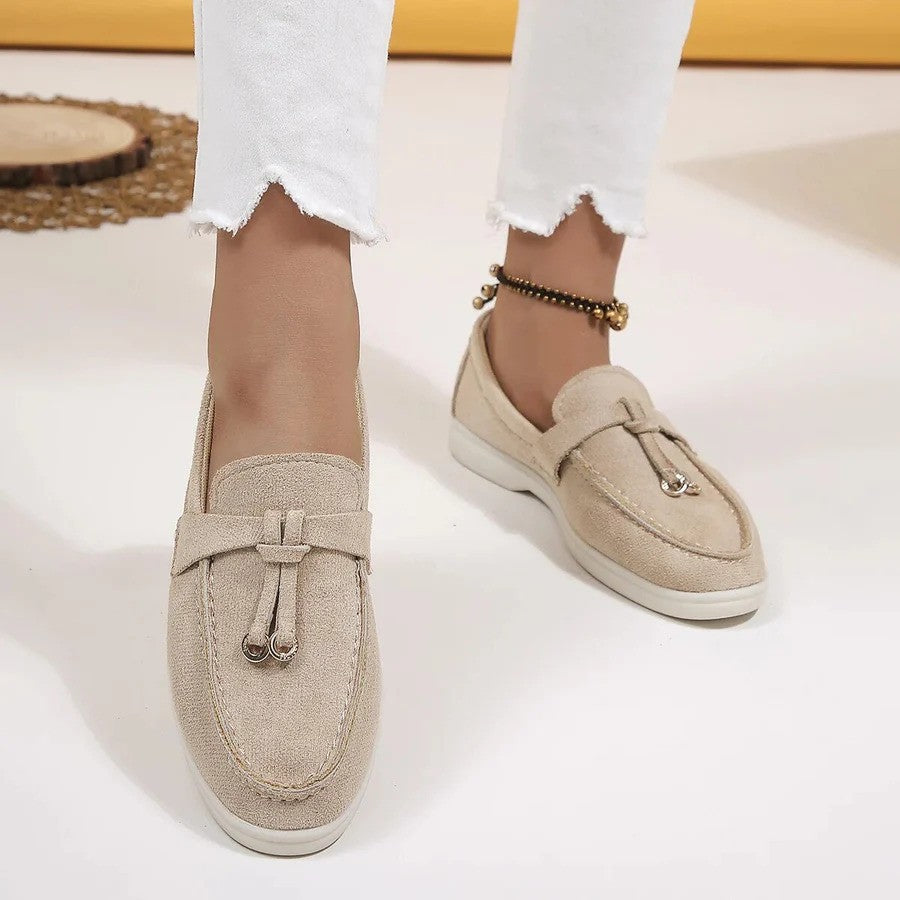 Women's slip-on flatform loafers with metal eyelet detail