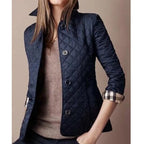 Women's tailored jacket with structured collar and front button fastening