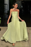 Women's textured bodice pleated skirt strapless maxi wedding guest dress