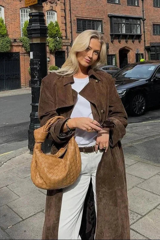 Women's trench coat with belt and lapel collar