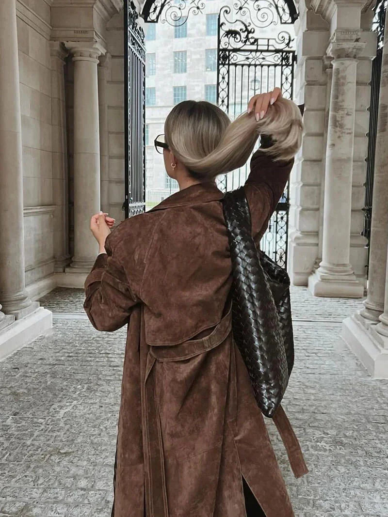 Women's trench coat with belt and lapel collar