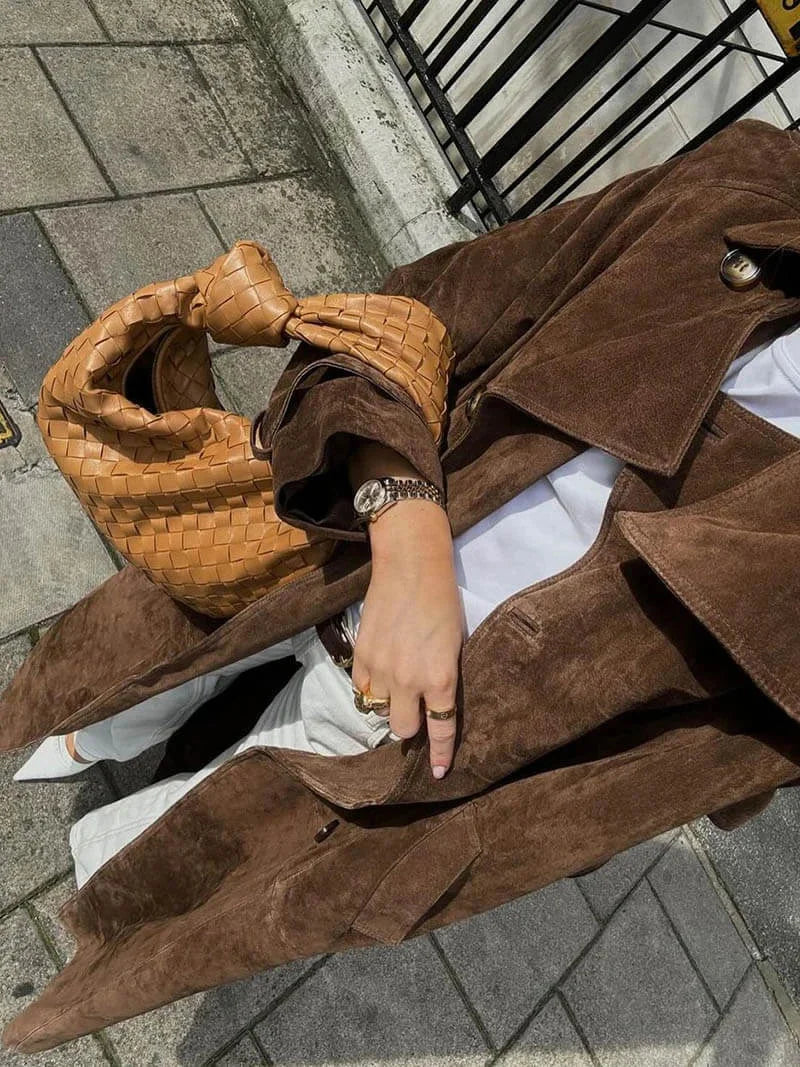 Women's trench coat with belt and lapel collar