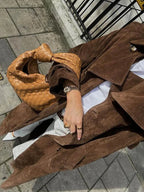 Women's trench coat with belt and lapel collar