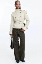 Women's trench coat with high collar and tie belt