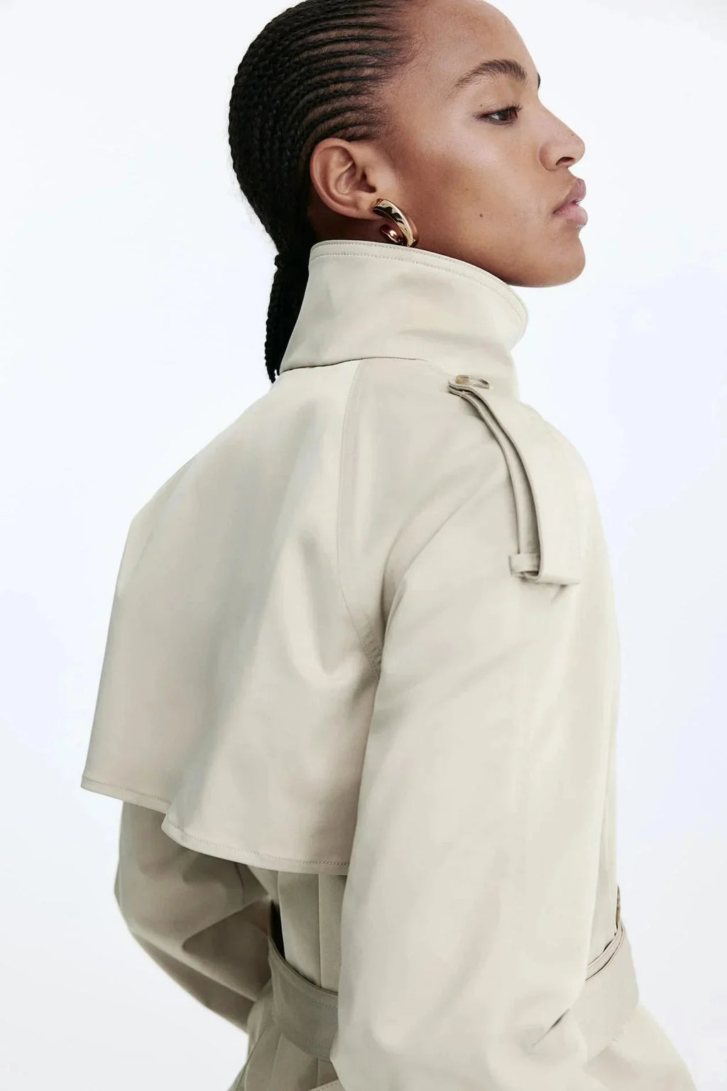 Women's trench coat with high collar and tie belt