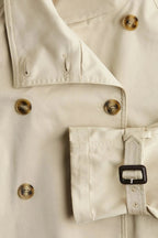 Women's trench coat with high collar and tie belt