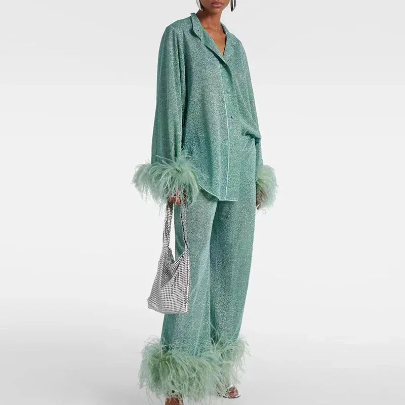 Women's two-piece set with feather-trim sleeves and feather-trim hem
