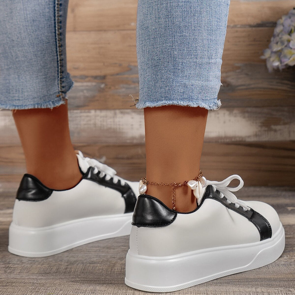 Women's two-tone low-top platform sneakers with lace-up front
