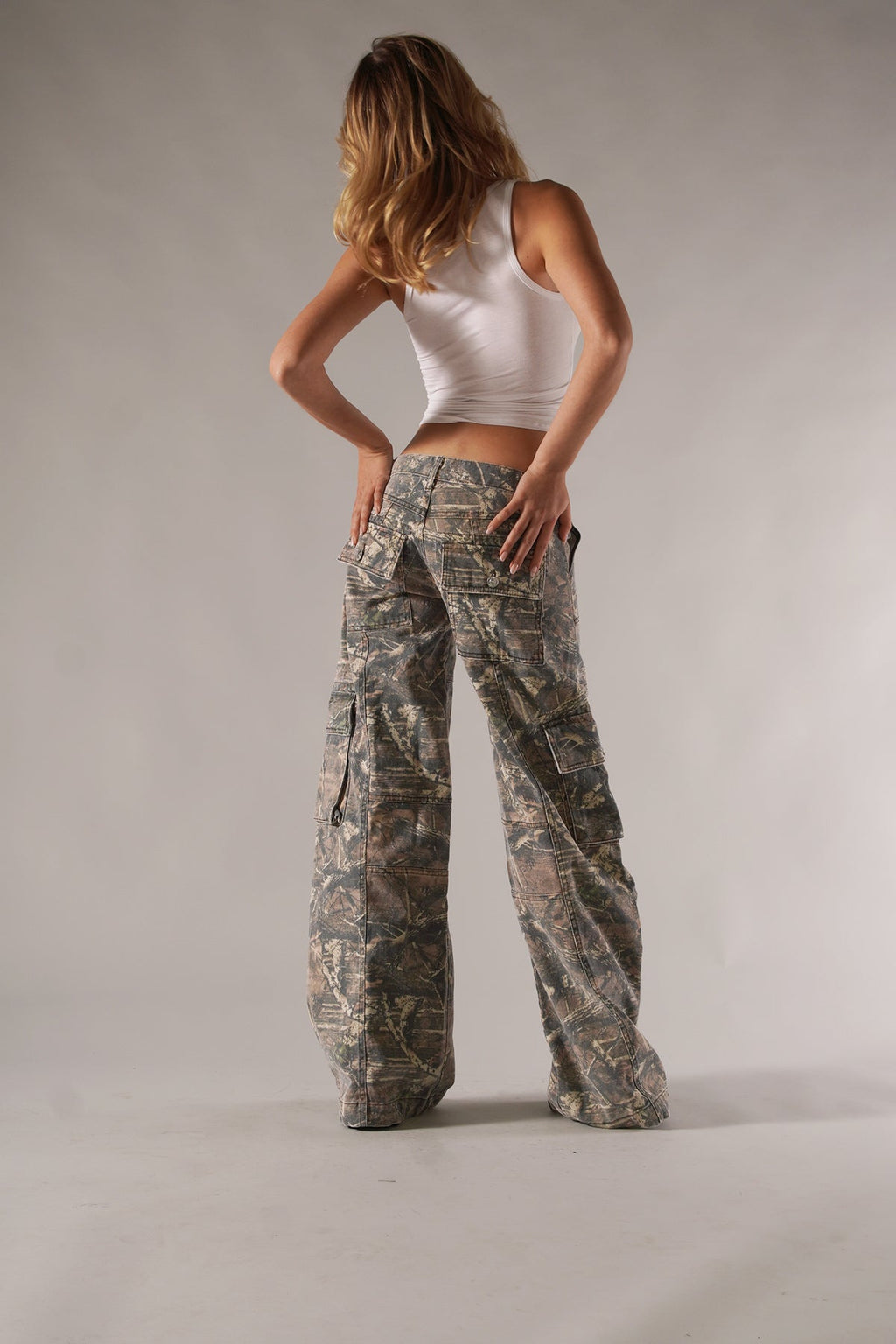 Women's wide-leg camo cargo pants with utility pockets