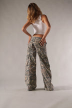 Women's wide-leg camo cargo pants with utility pockets