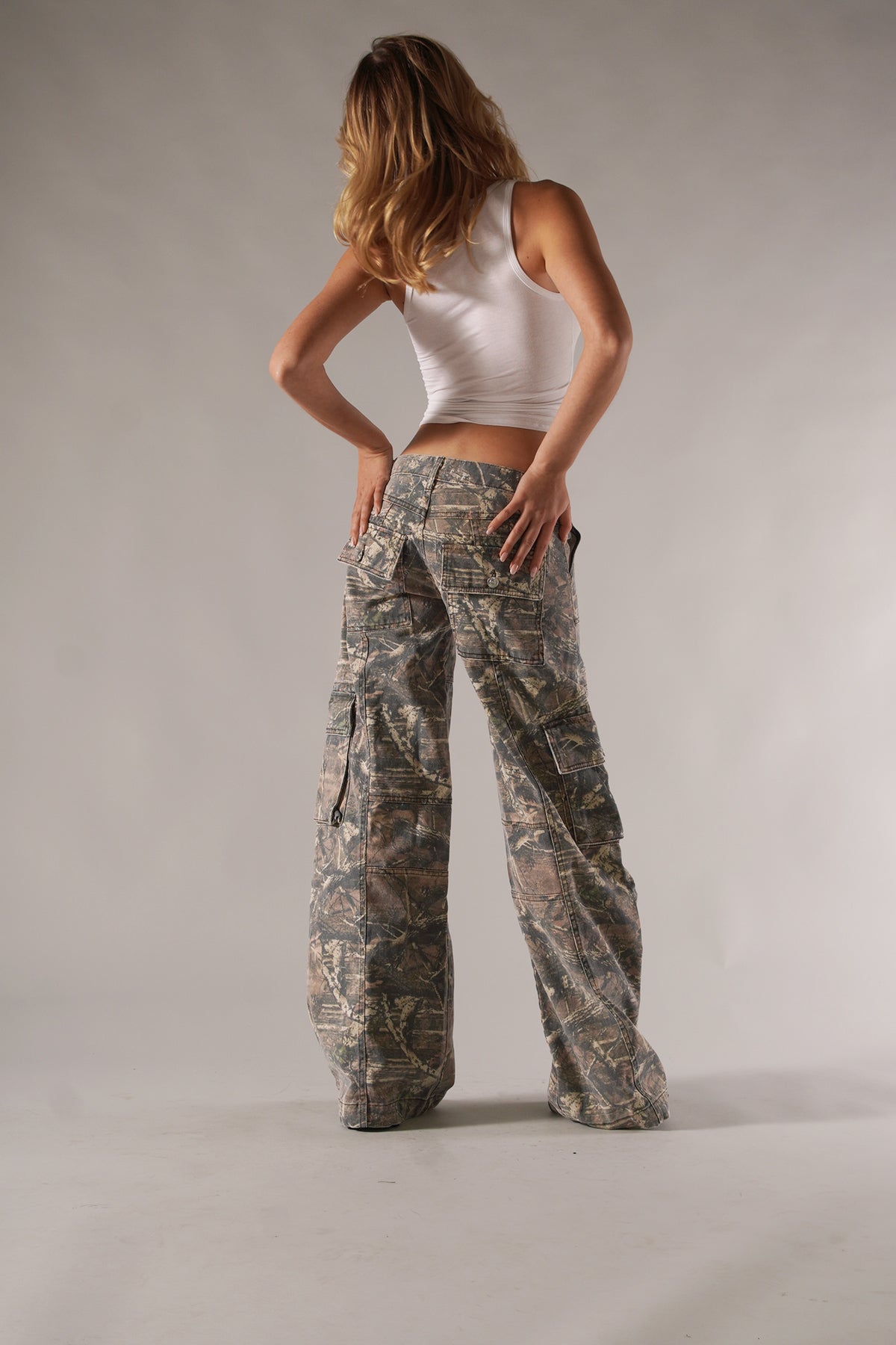 Women's wide-leg camo cargo pants with utility pockets